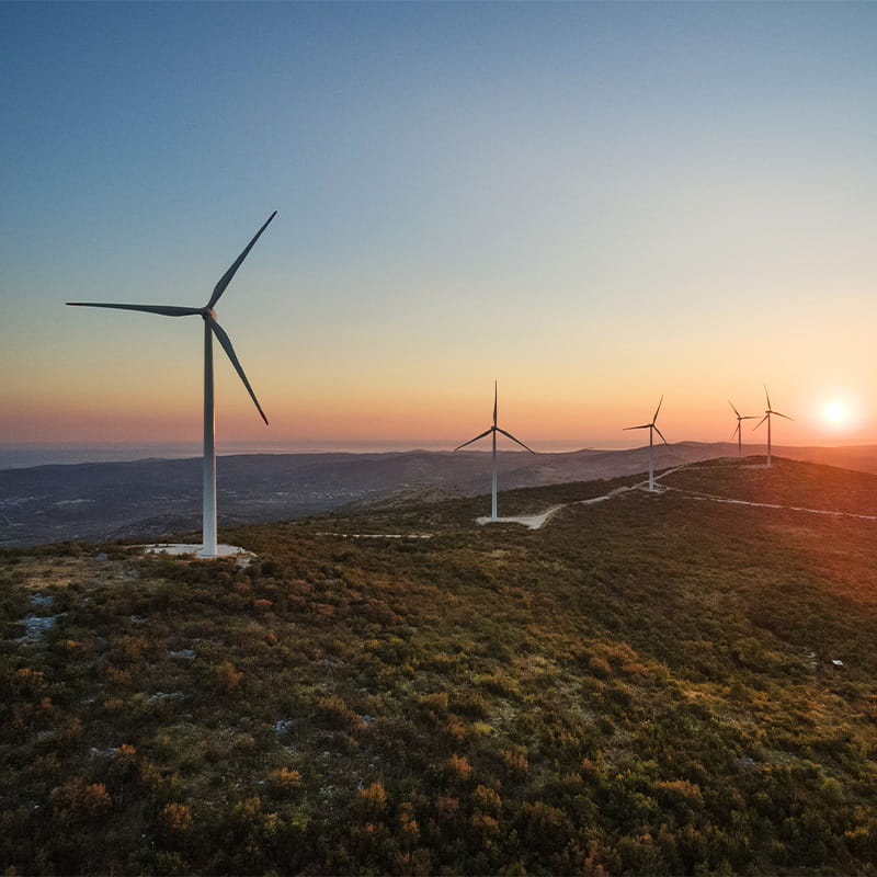 Energy Production Systems Windmills producing electric energy on Velebit mountain on a clear day during sunset